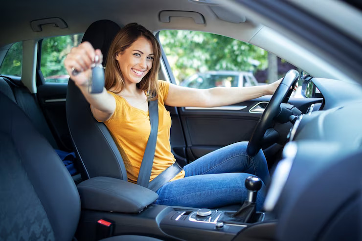 beautiful-female-women-driver-sitting-her-vehicle-holding-car-keys-ready-drive_342744-684