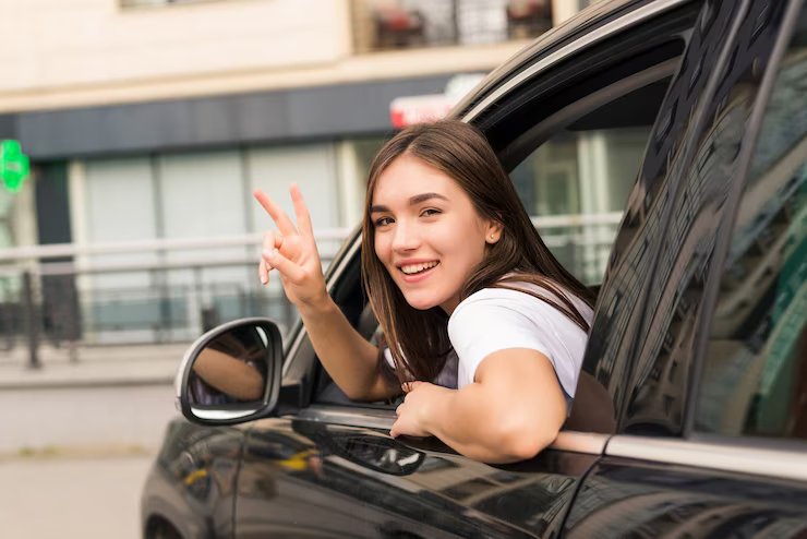 driver-woman-car-waves-back-as-sign-farewell-street_231208-11933